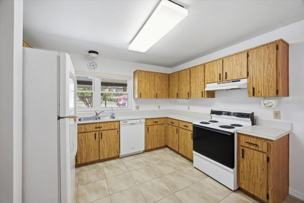 Photo of 535 Hunter Circle #535, Kissimmee, FL 34758 (MLS # O6409308)