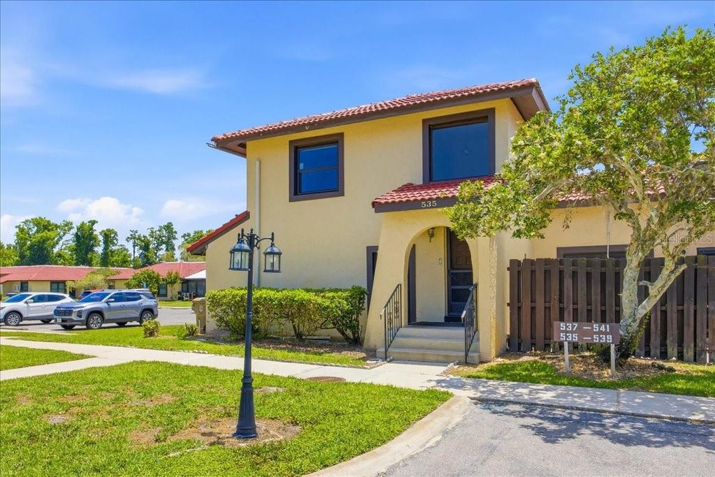 Photo of 535 Hunter Circle #535, Kissimmee, FL 34758 (MLS # O6409308)