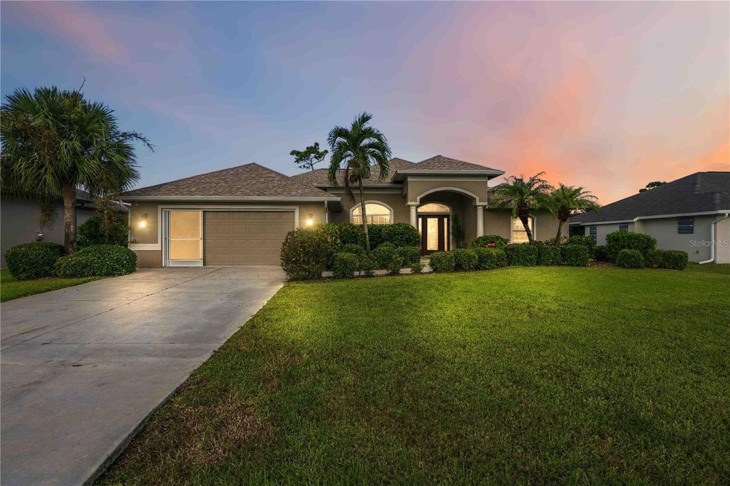 Photo of 244 Fairway Road, Rotonda West, FL 33947 (MLS # D6148759)