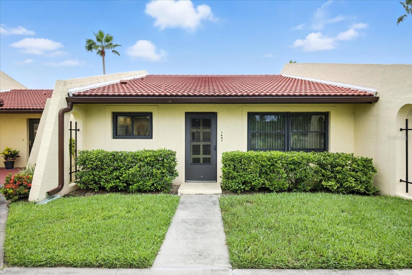 Welcome to 1487 56th St W, Bradenton– a beautifully updated condo in the friendly 55+ community of Meadowcroft! This charming home features high ceilings, 2 bedrooms and baths, new engineered wood floors throughout the living area and bedrooms, offering both elegance and durability. The updated kitchen boasts stainless steel appliances and sleek granite countertops, perfect for preparing meals and entertaining. Enjoy peace of mind with a newer roof, a top-of-the-line Trane HVAC system, and new impact windows and glass doors that lead to a sunny patio, ideal for relaxing or hosting guests.
Residents of Meadowcroft have access to fantastic amenities, including a community pool, tennis courts, and shuffleboard, ensuring an active and social lifestyle. This move-in-ready condo combines modern upgrades with the convenience of low-maintenance living in a welcoming 55+ community. Located just minutes to shops restaurants, and the white sand beached of the gulf, and just 20 minutes to Sarasota Airport. Don’t miss the opportunity to make this delightful home yours – schedule a showing today!