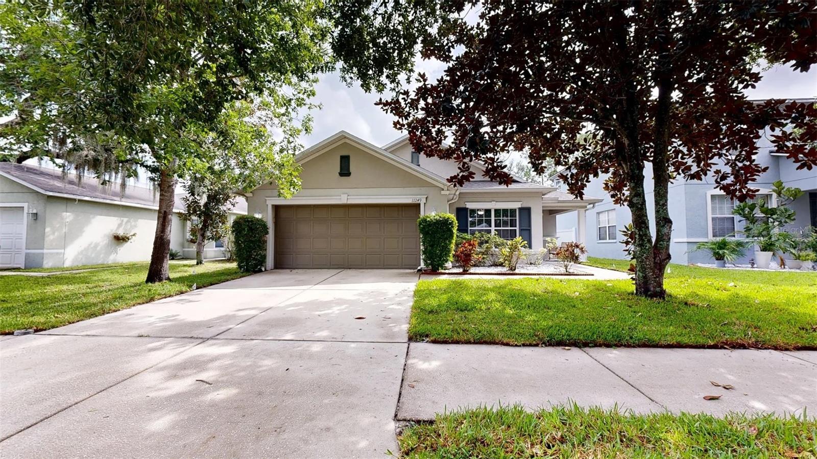 Fall in love with this charming home and its prime Riverview location with close proximity to Winthrop Town Centre, Brandon Mall, dining, parks, and top-rated schools – plus quick access to I-75, US-301 & Selmon for easy trips to Tampa & the Gulf beaches. Enjoy open living spaces that feel warm and inviting the moment you walk in. This move-in ready home features an attached garage, a large patio, luxury vinyl flooring throughout, updated appliances, a new roof, new sod, and more. Don’t miss out on this home with its exceptional value just awaiting its new owner – schedule your showing today!