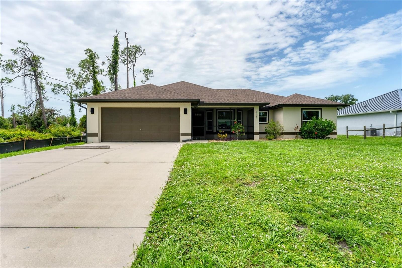 Welcome to this beautifully maintained single-family home offering 3 spacious bedrooms and 2 full bathrooms with no HOA or CDD fees! This move-in ready home offers an open floorplan. The spacious kitchen with great cabinet and countertop space overlooks the family room and has a large dinette area. The primary bedroom has a large walk-in closet and an en-suite that was remodeled in 2021. The roof and AC were both replaced in 2023 and the interior and exterior were painted in 2023. Nothing left to do but move in!