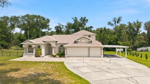 Photo of 13123 Saddle Way, Brooksville, FL 34614 (MLS # TB8527345)