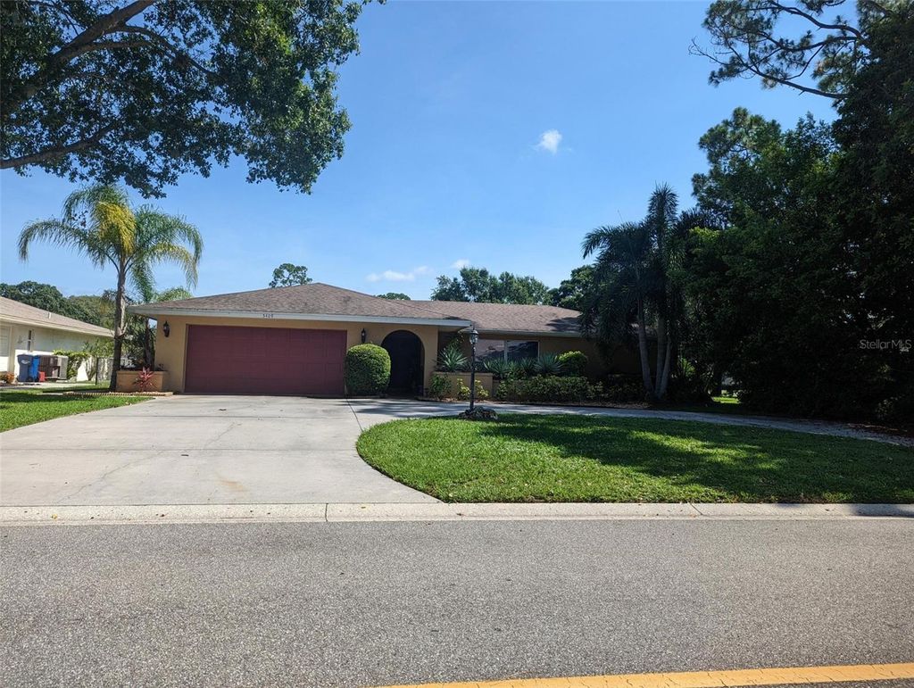 Photo of 5409 Palm Aire Drive, Sarasota, FL 34243 (MLS # A4676777)