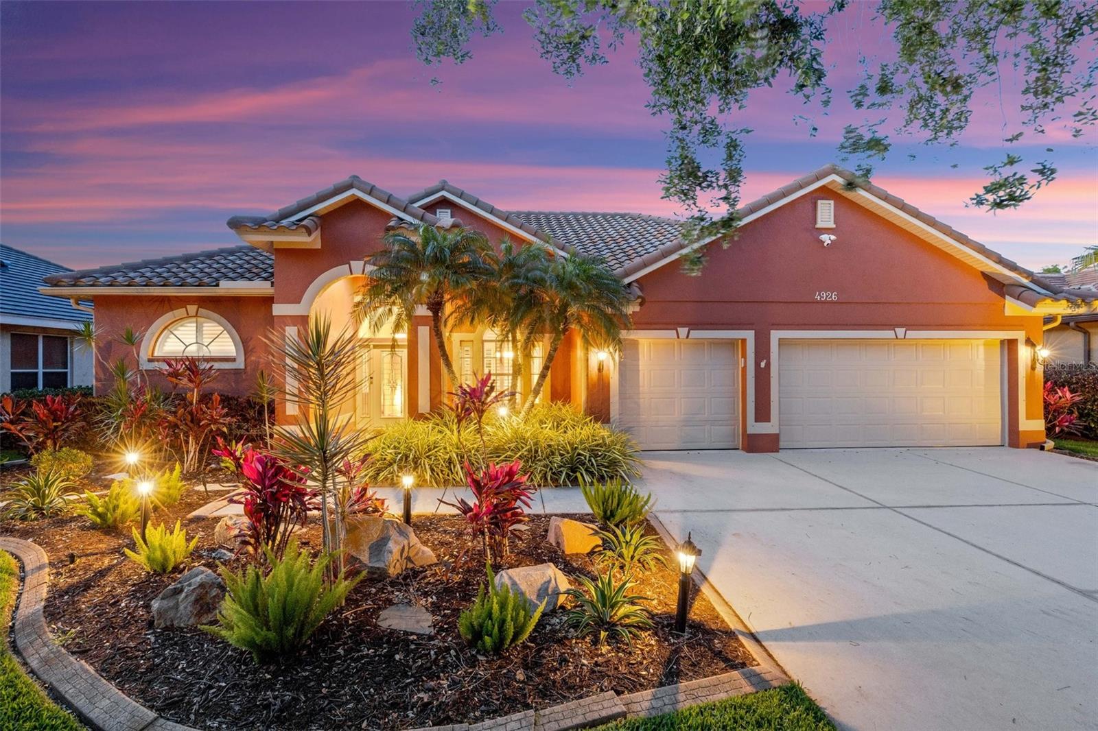 New Price! Perfect Opportunity! A pot of gold is what you'll find when you experience luxury living in your new home. Another stunning creation by US homes is conveniently located off McIntosh Rd and nestled in the heart of Palmer Ranch. Turtle Rock is a well-established gated community that features a community center, heated pool, tennis courts, pickleball and basketball. This home has been well cared for and loved with their heart and soul. The meticulously planned landscape with its creative lighting is breathtaking as you walk up your extra wide driveway. The beautiful decorative glass entry door with its side lights is inviting you into a world of delight. A breathtaking view of the botanical garden is located on your oversized screened lanai. Always time for relaxing and enjoying your favorite beverage as you listen to the babbling brook and soothing water features of your free-flowing fountain. Many guests have enjoyed the tranquility of this backyard setting. The living and dining area transitions graciously to the master bedroom and living areas.
The pristine 4-bedroom home with a large bonus room/office executive comfort and privacy has been impeccably maintained. Many bells and whistles are unique and present in this home. You will find plantation shutters, crown molding, ship lap accent wall, upgraded fans and lighting throughout this home. The unique custom wood shelves and barn door make quite a statement when you enter the family room. A true delight is calling all chefs as they prepare their perfect delicacy for guests in their spacious kitchen with new stainless-steel appliances, ample Corian counter tops and expansive pantry, eat-in kitchen and breakfast bar. The primary suite is a true retreat and boasts luxurious features such as professionally designed walk-in closet, generously sized separate shower, garden tub and tower storage on each side of dual sinks. Featuring a ring security system that has cameras throughout the outside with additional motion detectors. The large 3 car garage also has ample attic storage with bright lighting and flooring. The roof has been replaced in 2019. Located near the Legacy trail, medical facilities, beaches, churches, retail shops, restaurants and a whole lot more. This home has been impeccably maintained and manicured throughout. Don't delay, schedule your showing today!