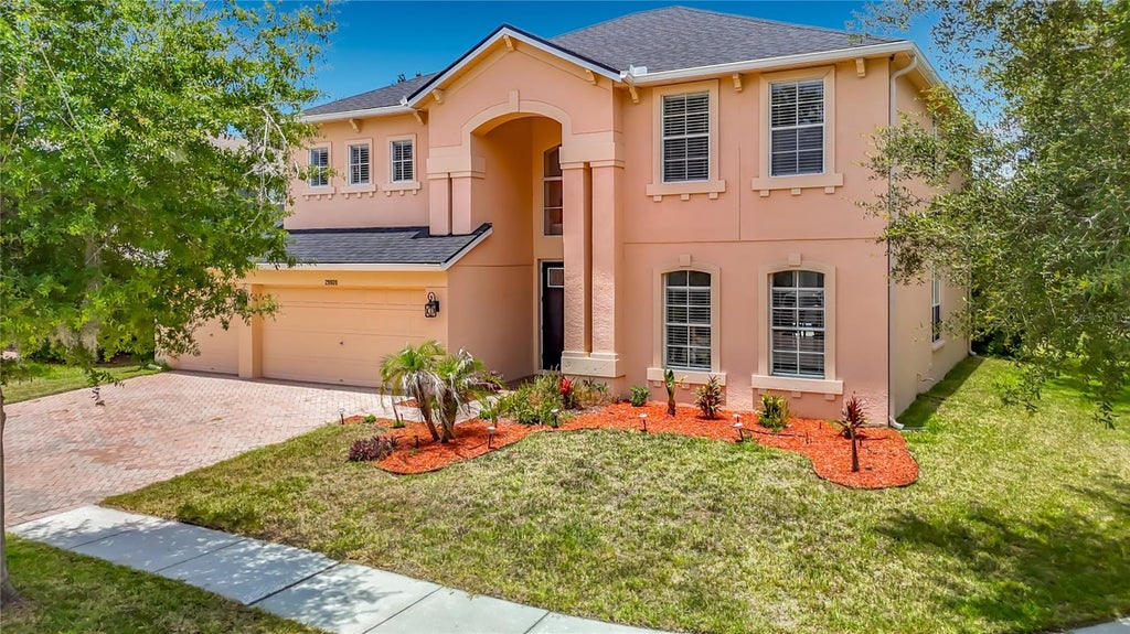 Photo of 29909 Cedar Waxwing Drive, Wesley Chapel, FL 33545 (MLS # TB8523482)