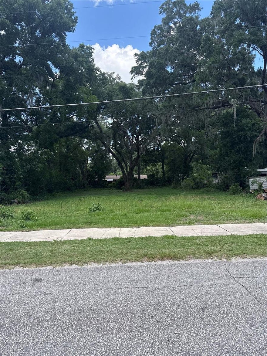 This spacious lot totaling .46 acres inside the city limits is the perfect blank canvas for your dream home. With water and sewer already in place and ready to connect, you’re one step closer to breaking ground instead of breaking the bank. Conveniently located near shopping, schools, and medical facilities, you’ll have everything you need just minutes away. Plenty of room for your new build, a pool, a workshop—or finally enough space so the neighbors can’t hear your karaoke nights. Opportunities like this don’t come around often, so stake your claim before someone else beats you to it!
