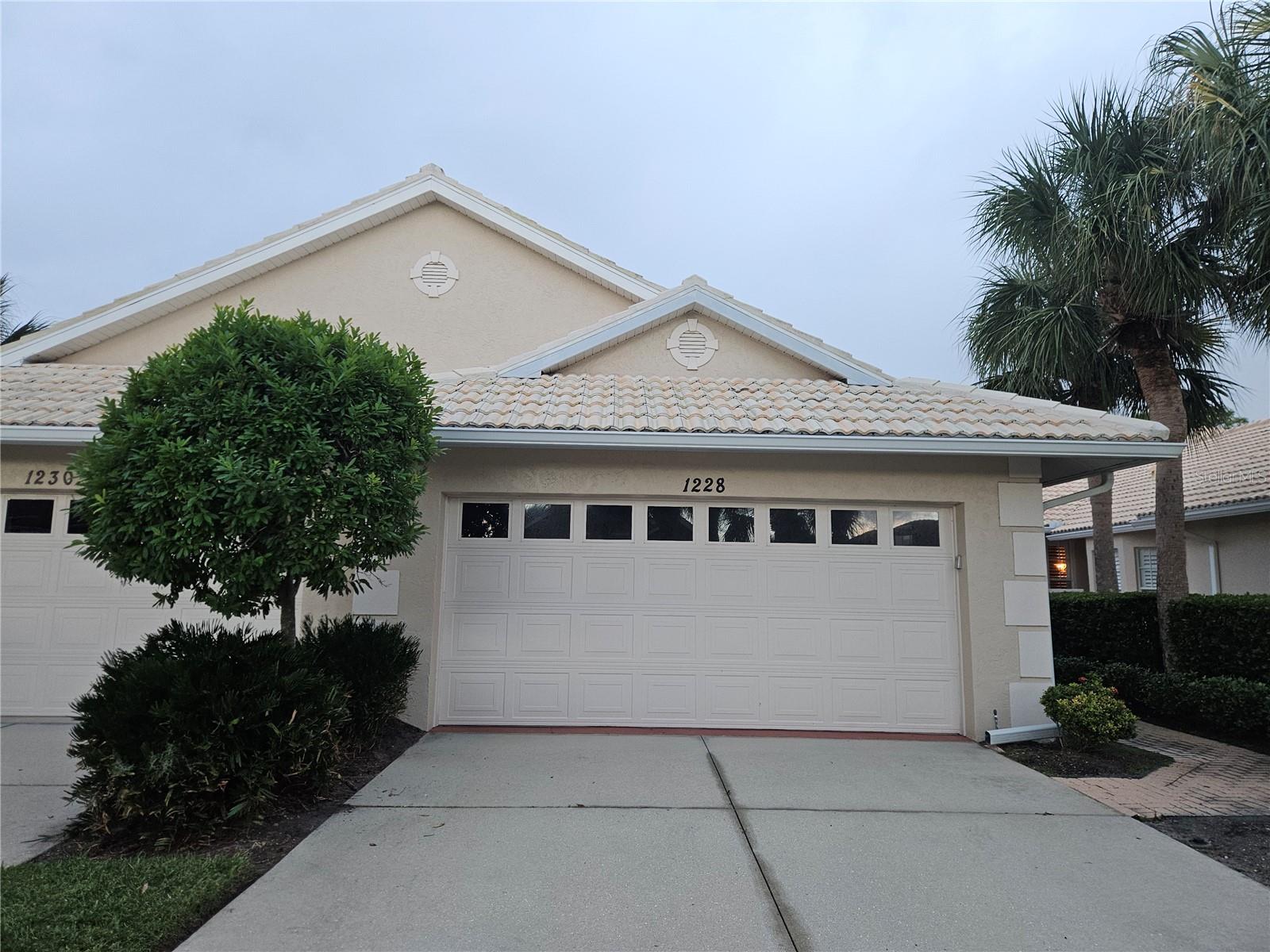 Great opportunity in the sought-after gated golf community of Berkshire Place at Waterford! This 2-bedroom, 2-bath villa offers a spacious, light-filled layout with high ceilings, an enclosed porch, and a private courtyard—perfect for relaxing or entertaining. The thoughtful split-bedroom floor plan provides comfort and privacy, while the open living areas create a welcoming flow throughout. Ready for your personal touch and updates, this home offers the chance to design your ideal Florida retreat. Enjoy maintenance-free living and resort-style amenities including a heated pool and spa, fitness center, tennis courts, upcoming pickleball courts, and optional golf membership with access to Waterford’s 27-hole championship course. Ideally located just minutes from historic downtown Venice, Gulf beaches, shopping, dining, and scenic parks. Bring your ideas and make this home shine again! Sold As-Is.