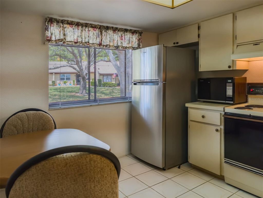 Photo of 11231 Dollar Lake Drive #5, Port Richey, FL 34668 (MLS # TB8491094)