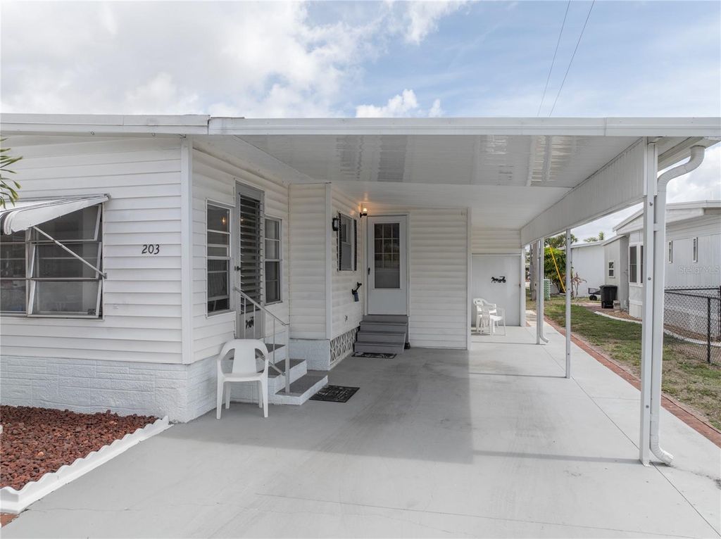 Photo of 203 Harvest Lane, North Fort Myers, FL 33917 (MLS # C7523278)