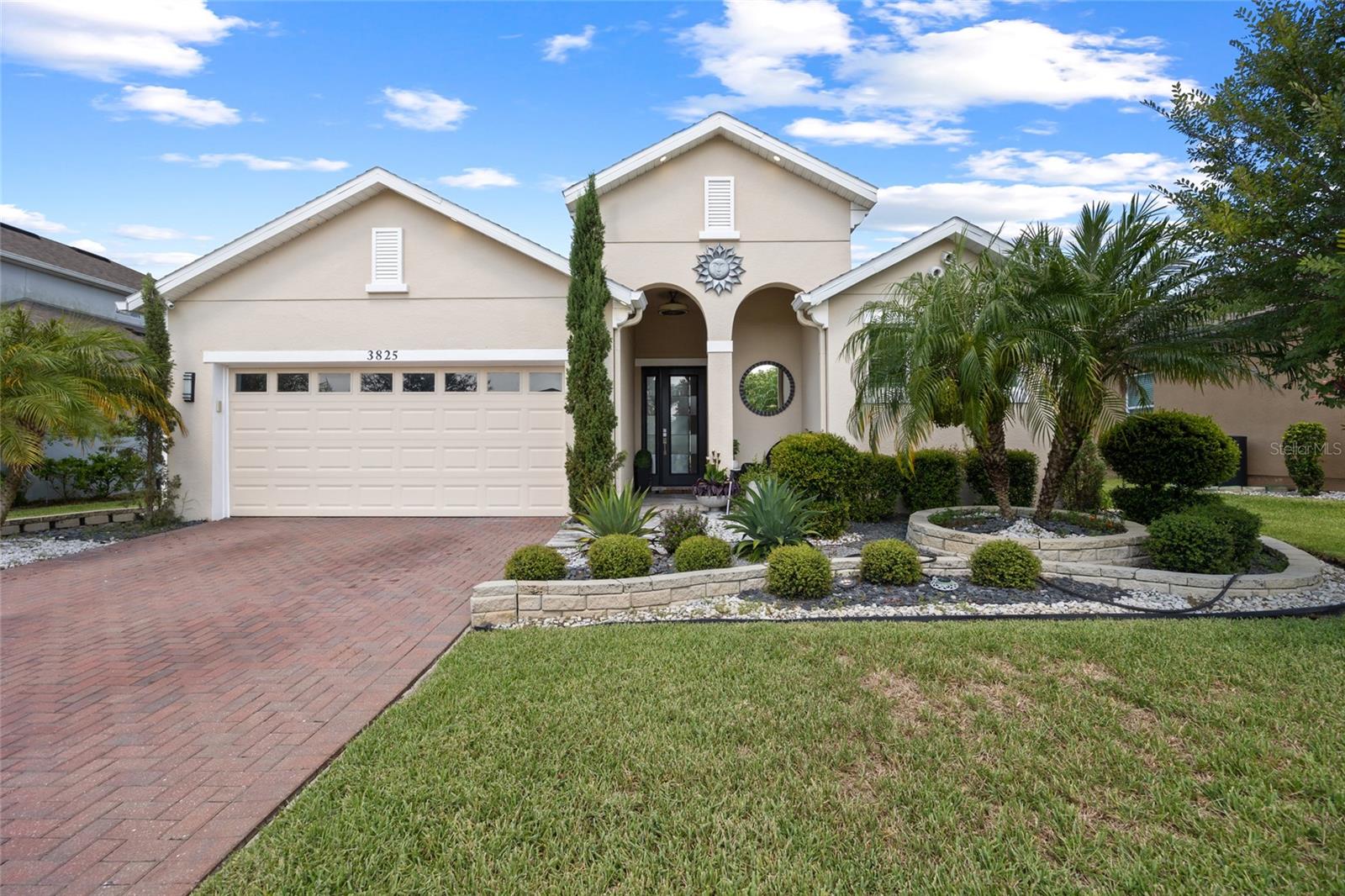 One or more photo(s) has been virtually staged. Welcome to WYNDHAM PRESERVE, a gated community. This immaculately maintained 4-bedroom, 3-bathroom home offers the perfect blend of comfort and convenience, featuring a Florida-style design that is ideal for everyday living and creating unforgettable memories. Brand New swimming Pool with a heated Spa.
Step inside to a warm and inviting living space, featuring a fireplace that's ideal for cozy evenings.
The open-concept kitchen features a granite island, wood cabinets, stainless steel appliances, along a dining area that seamlessly integrates with the living room. Sliding doors lead to a spectacular, crystal-clear pool. The master bedroom is very spacious, featuring windows that allow you to enjoy natural light, a walk-in closet, and an en-suite bathroom with dual sinks, vanity space, a separate shower, and a private water closet.
Throughout the home, you'll enjoy ceramic tile flooring, combining elegance and low maintenance. The three additional spacious bedrooms provide plenty of room for family and guests, and one of the bedrooms is set up for a home office with additional features. Two additional full bathrooms are beautifully upgraded with windows providing natural light. Large laundry room, Zebra blinds with remote control throughout the home, exterior lights, water softener, gutter system, and Solar panel system. The driveway adds curb appeal and leads to a two-car garage with epoxy flooring. Camera system. Pool pictures are virtually staged.