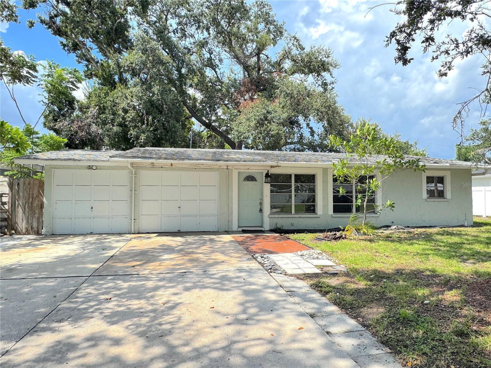 ANNUAL Rental- Pets case by case for a monthly fee- all occupants over 18yrs old will need a credit/background check. Washer/Dryer will be installed by landlord. Welcome to Eastwood Oaks! A conveniently located community close to downtown Sarasota, Lakewood Ranch, schools, major routes, shopping and more! This home has a spacious layout with a large living room located at the back of the home. Dining area and room for bar stools right off the kitchen. Pantry closet in the laundry room and tons of garage storage! Main bedroom has an attached walk-in closet and full bathroom. Both secondary rooms share a hallway full bathroom with a linen closet in the hallway. Tons of parking on the extended driveway. Screened in lanai for outdoor enjoyment and a large yard (fencing being replaced).