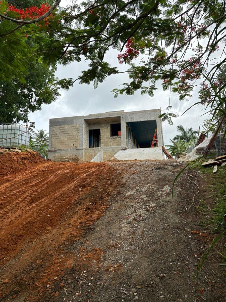 Under Construction. Brand New Construction, Single Family Residence in Bayamon, PR. This beautiful house, 3 bedrooms, 2 bathrooms, and 2-car garage will be your new home. This property is located right in front of Urb. Flamingo Hills, Bo. Pajaros, Sector Calderon, on Calle Principal B. Private entrance, beautiful view, just a few minutes away from Carr. #2, Carr. #167, Caribbean University, Schools, places of worship, malls and supermarkets. Concrete block construction allows you to build a second unit if you want to have an additional dwelling unit, terraza, etc. We accept all Housing Vouchers. The property should be completed on or before July 31st 2025. Pin on Google Maps 18°23'27.0"N 66°11'13.4"W