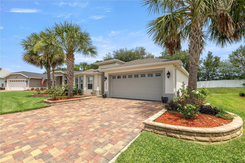 Photo of 10367 Addison Shore Way, Oxford, FL 34484 (MLS # OM725939)