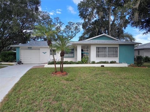 Photo of 10641 Tonapa Loop, Port Richey, FL 34668 (MLS # TB8548955)
