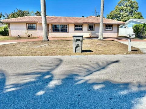 Photo of 1129 Edgehill Road, West Palm Beach, FL 33417 (MLS # TB8479673)