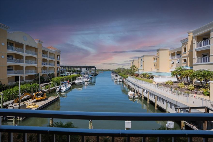 Experience exceptional waterfront living at Osprey Harbor Village. This 3-bedroom, 2-bath residence offers 2,374 sq ft of well-designed space with direct west-facing views of Little Sarasota Bay from every main room. Located in one of Osprey’s most desirable boutique waterfront communities, this condo includes a deeded 40’ wet slip, providing immediate access to boating, fishing, and the Intracoastal Waterway.
Inside, the home features high ceilings, an open layout, and a spacious kitchen with premium cabinetry and high-end appliances. The large living and dining areas flow seamlessly onto a covered balcony that overlooks the marina and bay—perfect for sunset views and outdoor dining. The primary suite is a true retreat with water views, balcony access, and a brand-new designer bathroom with a spa soaking tub, rain shower with bench seating, under-floor lighting, and modern double vanities. Residents enjoy a private, resort-style atmosphere with a heated bayside pool and spa, clubhouse, fitness center, sauna, billiards, BBQ grills, and a full-service marina. Ideally situated between Sarasota and Venice and minutes to Midnight Pass beach, this location offers easy access to waterfront dining at Casey Key Fish House and Deep Lagoon, nearby parks, and all the coastal conveniences of Osprey. This is a rare opportunity to own a spacious waterfront condo with refined interiors, exceptional views, and a dedicated 40’ slip—all within a beautifully maintained, luxury marina community. New Metal Roof on all buildings Oct 2025, AC replaced in 2020, new kitchen and bathrooms in 2024, new carpet in bedrooms in 2021.