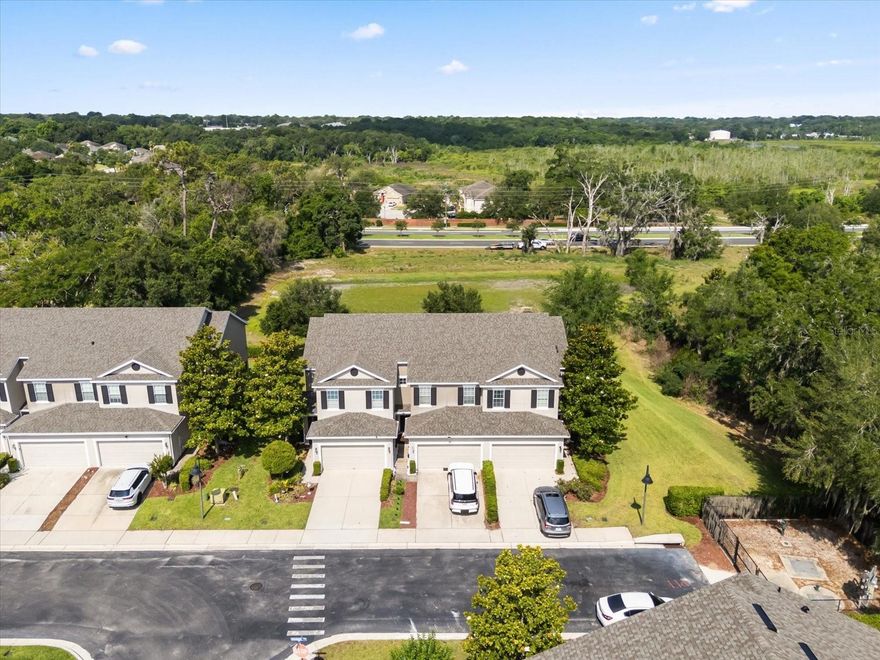 **Stunning Townhouse in West Orange County with Modern Upgrades and Prime Location**
Discover this beautifully renovated 4-bedroom, 2.5-bath townhouse nestled in a prestigious gated community in West Orange County, offering an exceptional blend of contemporary elegance and functional comfort. Built in 2013, this captivating home was fully renewed in 2024, showcasing extensive upgrades designed to elevate your living experience. Experience the perfect combination of style, convenience, and community amenities, just minutes from major highways, parks, and shopping centers.
Step inside to a spacious layout featuring all-new laminate flooring throughout, creating a sleek, modern aesthetic free of carpets. The heart of the home, the kitchen, has been beautifully redesigned with a striking custom wood slat-wrapped island, complemented by freshly painted cabinetry and state-of-the-art finishes. The family room exudes contemporary charm with elegant wood slat accents and stylish lighting fixtures, perfect for relaxing or entertaining guests.
The primary bedroom is a true retreat, featuring an elegant accent wall with vertical wood slat panels illuminated by warm integrated LED lighting, adding a touch of sophistication. The modern walk-in closet offers sleek open shelving, built-in drawers, and plenty of storage. The fully renovated bathroom boasts modern finishes and a sophisticated design, providing a spa-like experience at home.
The laundry room is thoughtfully designed with built-in cabinetry, offering both style and functionality, with washer and dryer included for your convenience. Step outside to a stunning backyard oasis featuring a contemporary summer kitchen, an elegant barbecue area, artificial turf, and a stylish pergola—perfect for outdoor entertaining and relaxing.
Additional highlights include a roof replaced by the HOA in February 2026, ensuring peace of mind, and a newer A/C system less than five years old, providing energy-efficient comfort. The two-car garage offers ample parking and storage options.
Residents enjoy exclusive access to a gated community with a beautiful swimming pool, ideal for unwinding and enjoying sunny Florida days. Located in a rapidly growing area of West Orange County, this home offers easy access to major highways such as FL 429, FL 408, and Florida's Turnpike, making commuting a breeze. Nearby parks, shopping centers, and entertainment options further enhance the lifestyle this home provides.
Don’t miss the opportunity to own this exceptional townhouse—where modern upgrades meet unbeatable location. Schedule your private tour today and make this stunning property your new home!
**Your dream home awaits—act now to seize this incredible opportunity!**