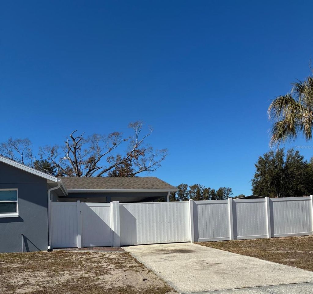 Photo of 1409 Wishing Well Way, Tampa, FL 33619 (MLS # TB8474141)
