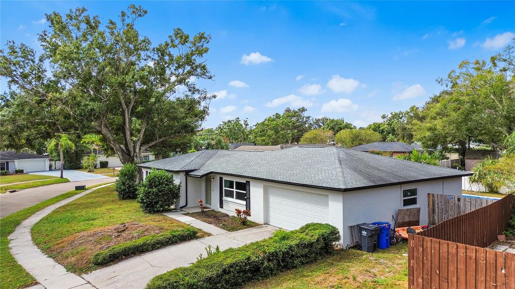 Photo of 3015 Saint Charles Dr, Tampa, FL 33618 (MLS # TB8466279)