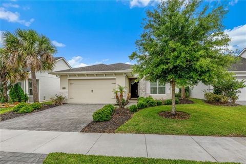 Photo of 6243 Woodhaven Village Drive, Port Orange, FL 32128 (MLS # NS1088255)