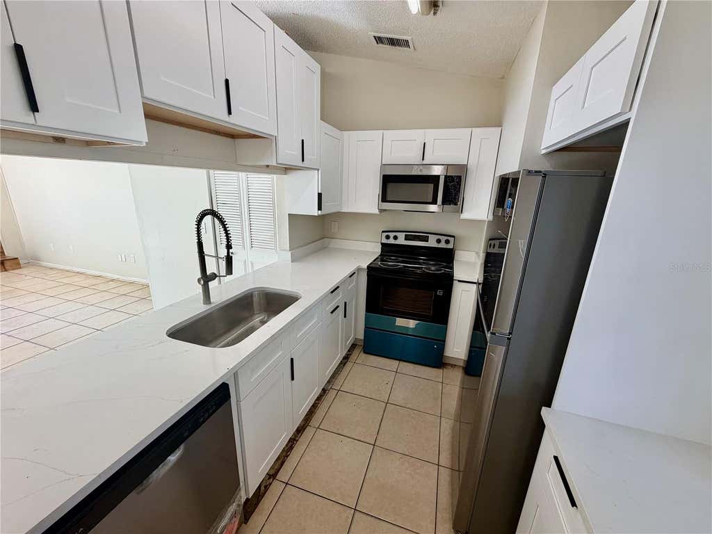 Photo of 918 Otto Villa Place #9, Tampa, FL 33612 (MLS # TB8534411)