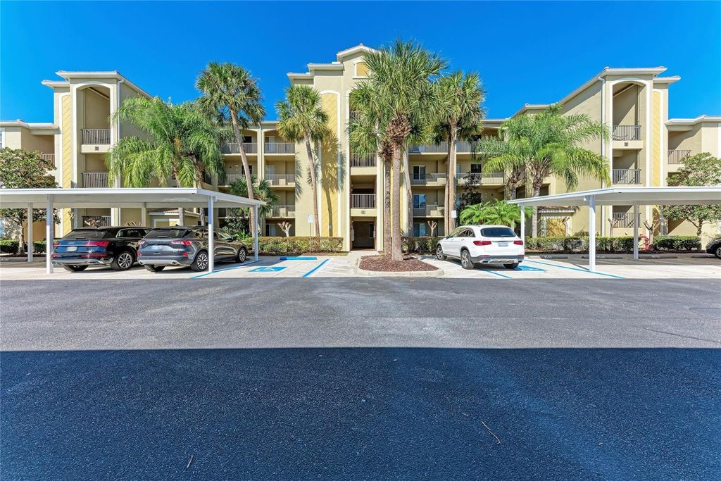 Photo of 7607 Grand Estuary Trail #104, Bradenton, FL 34212 (MLS # A4680842)