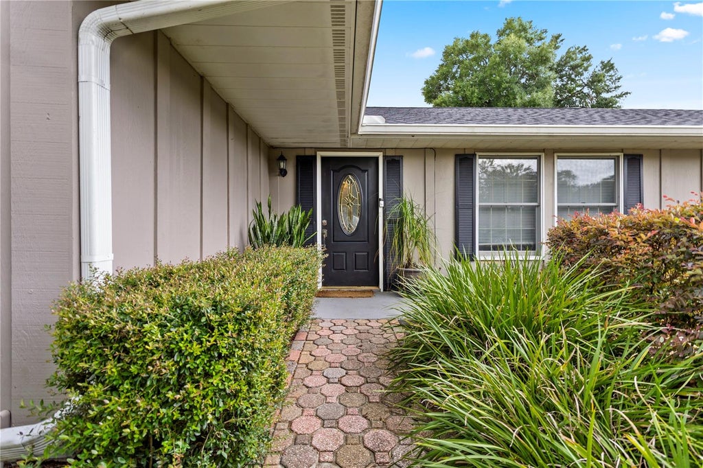 Photo of 1818 Crownwood Drive, Orlando, FL 32810 (MLS # O6448709)