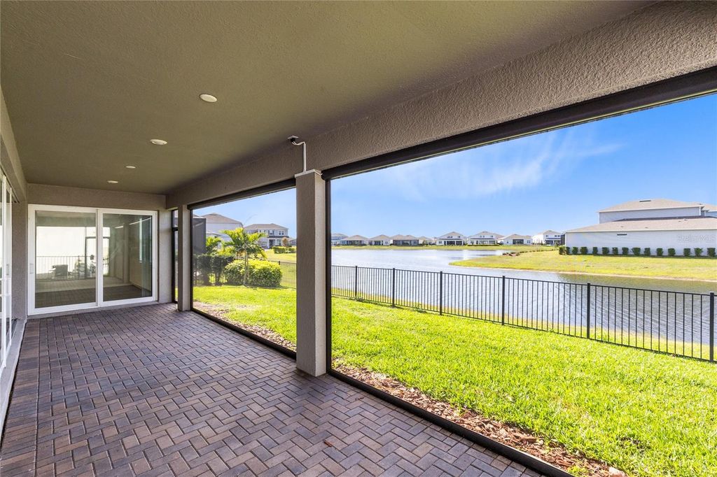 Photo of 13846 Tybee Beach Lane, Orlando, FL 32827 (MLS # O6373292)