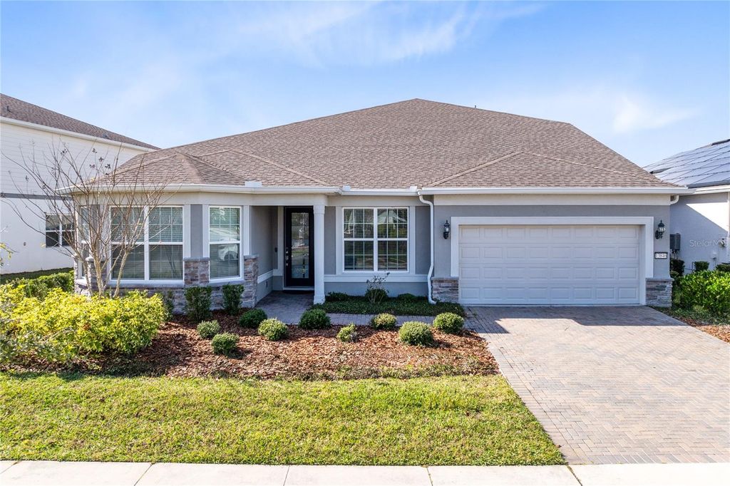 Photo of 13846 Tybee Beach Lane, Orlando, FL 32827 (MLS # O6373292)