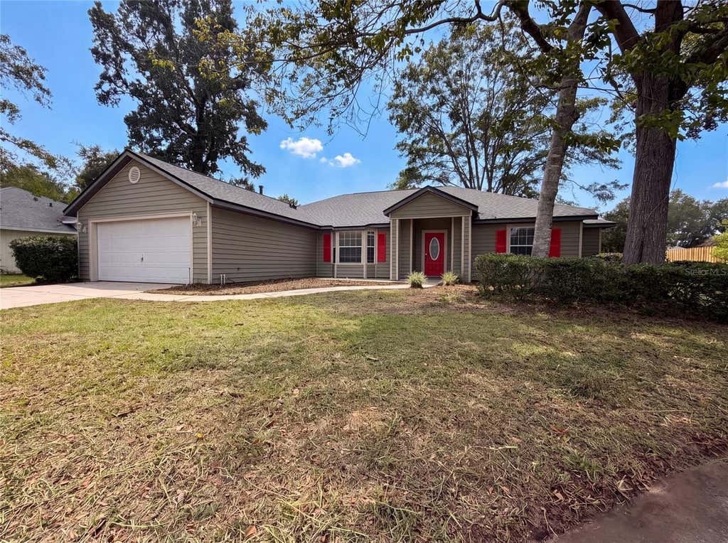 Photo of 944 NW 87th Drive, Gainesville, FL 32606 (MLS # O6430354)