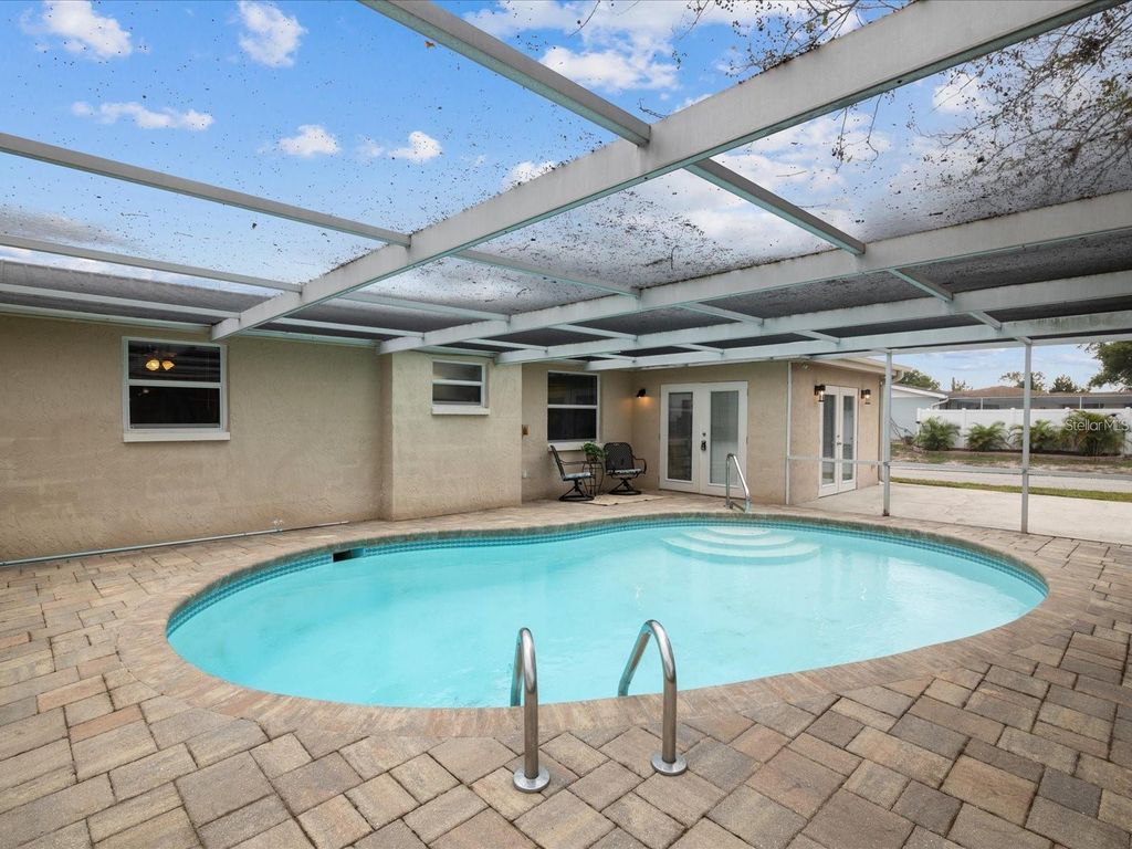 Photo of 9331 Rainbow Lane, Port Richey, FL 34668 (MLS # TB8505590)