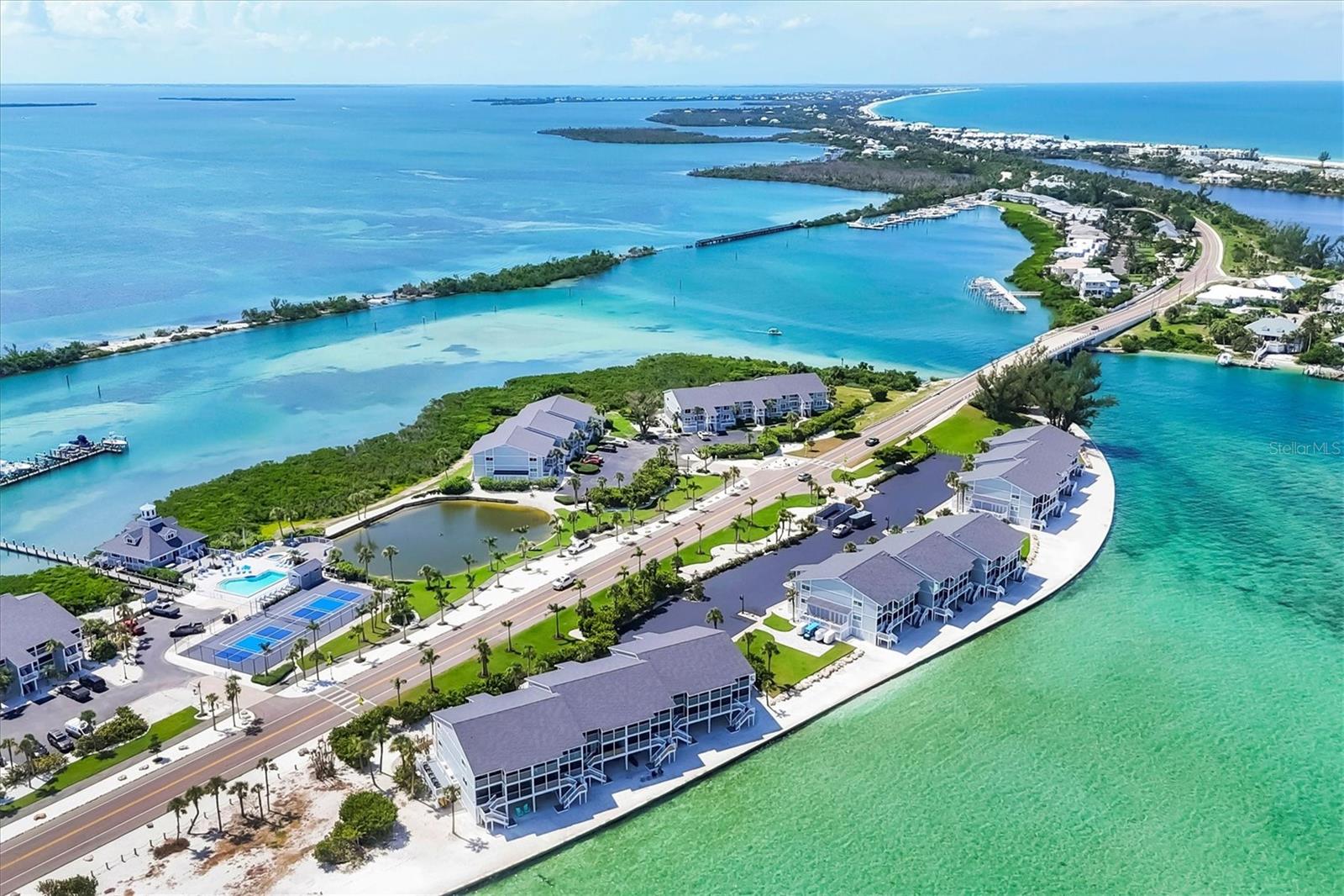 Completely remodeled second-floor unit located on the Bay side of Boca Grande North! This two-bedroom, two-bath condo has sweeping views of the Charlotte Harbor where you can watch the boats go by. Enjoy your morning coffee on the beautiful screened-in lanai while watching the glorious sunrise. The master bedroom has a king-size bed, and the guest bedroom has two full-sized beds for your comfort. There are three large smart TV's, one in the living room and one in each bedroom. This unit also has a washer and dryer for your convenience. Pets and smoking are not allowed in this unit. 3-night minimum.