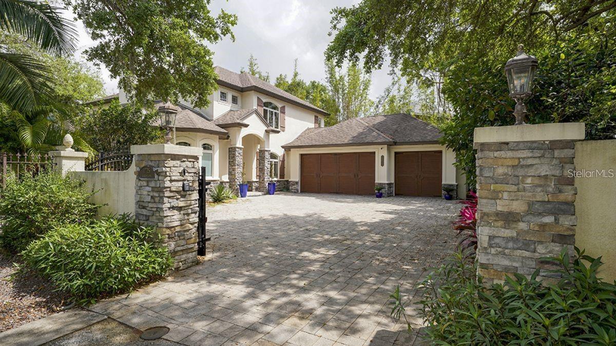 This MAGNIFICENT home is nestled away in the Historic Granada private neighborhood with easy access to all amenities. 4 Bedrooms 3.5 Baths and over 3500+ square feet of elegantly finished living areas. Authentic travertine tile and maple hardwood floors, volume ceilings, solid-wood cabinetry, two-sided fireplace, chef’s kitchen, three-car garage (owner uses one bay) and cypress wood exterior ceilings. Designed for entertaining, this splendid home can easily host large gatherings with a creative layout that enhances the flow between the kitchen, dining room and great room while keeping each space true to its function. The great room has a wood-burning fireplace and wall-to-wall sliding glass doors to the screened-in lanai/pool area. The chef’s kitchen, with eat-in peninsula and casual dining nook, features solid-wood cabinets, granite countertops, tile backsplash and stainless steel appliances. The master retreat on the first floor has a fireplace, French door to the lanai, two walk-in closets and On-suite bath with jetted tub and walk-in shower. Upstairs, a large bonus room has plenty of room for gaming with a pool table, TV, lounge area and large built in desk area. The second floor also has a large guest room with on-suite bath and a king size bed, and two additional bedrooms (king size beds)which has a Jack and Jill bathroom. Outdoors, living is equally lavish in the spacious, screened-in lanai with heated salt water pool and spa. Private gated courtyard has plenty of space for guest parking or play. At the entrance, an electric gate provides privacy and security. 5 minutes to Siesta Key Beaches, Restaurants and Shopping. SEASON $15,000, OFF SEASON $12,000 Owners will consider an annual rental at $10,000 a month. Property has been rented from mid February to mid April 2026. All other months are wide open. LUXURY, SARASOTA VACATION RENTALS, SIESTA KEY,