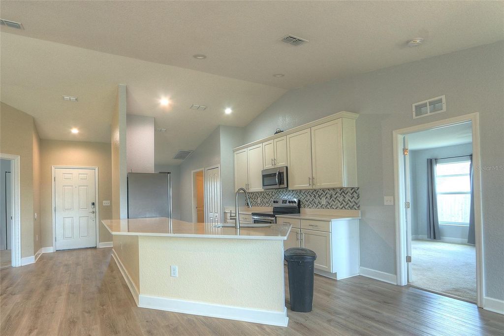 Photo of 110 Plum Avenue, Frostproof, FL 33843 (MLS # TB8521334)