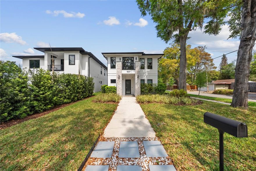 Modern new construction in a prime Orlando location, just moments from Winter Park, Audubon Park and Downtown Orlando. Positioned on a desirable corner lot within an established neighborhood with A-rated schools, this residence offers a refined balance of design, comfort, and location.

Featuring 4 bedrooms and 4 bathrooms across approximately 2,788 square feet, the home showcases a clean, open layout with well-defined living spaces, abundant natural light, and a seamless indoor flow.

A distinctive highlight is the garage, thoughtfully equipped with ceiling lighting and air conditioning, offering flexibility for a variety of uses beyond traditional parking.

A well-positioned property for those seeking privacy, quality, and proximity to some of Orlando's most desirable areas.