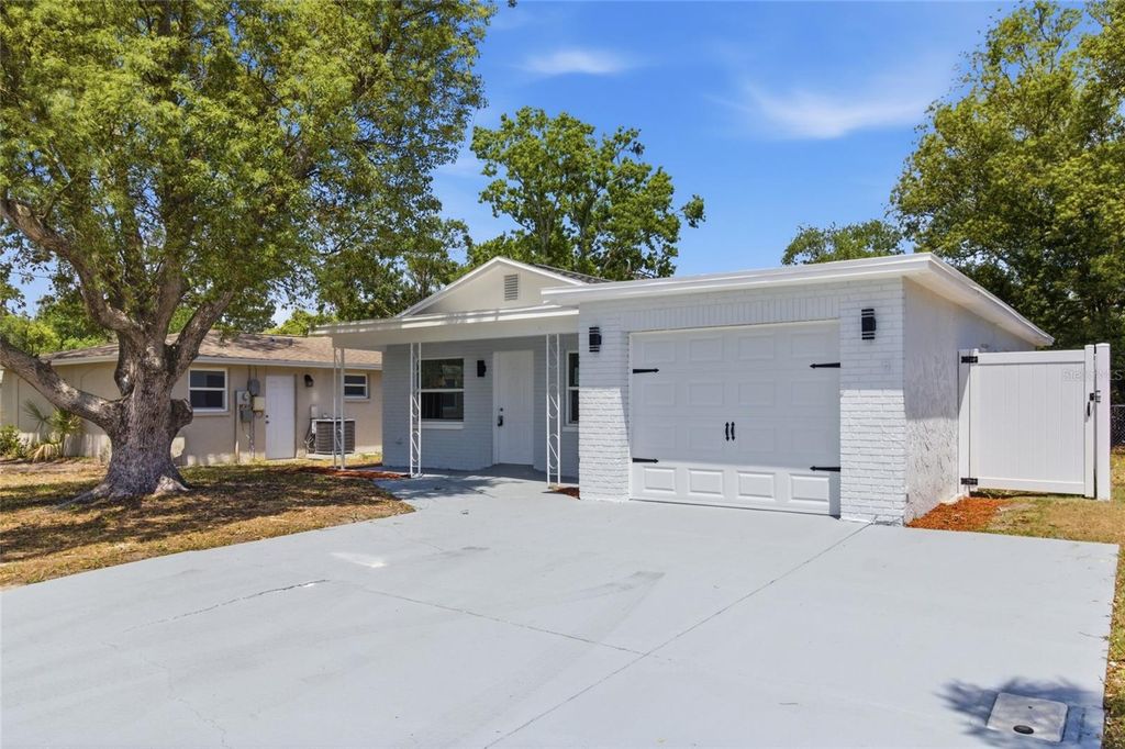 Photo of 3042 Bahia Avenue, Holiday, FL 34690 (MLS # TB8504500)