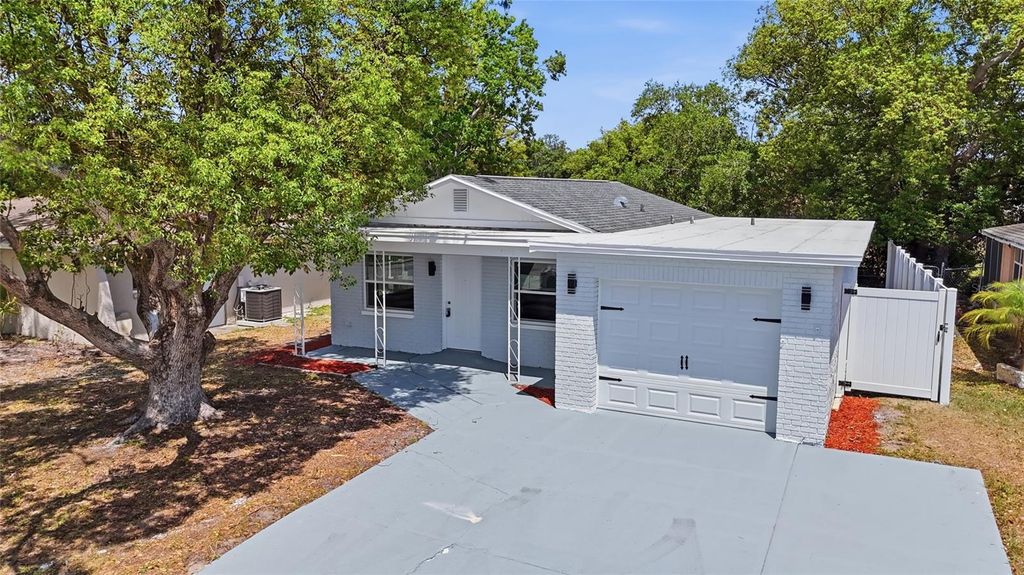 Photo of 3042 Bahia Avenue, Holiday, FL 34690 (MLS # TB8504500)