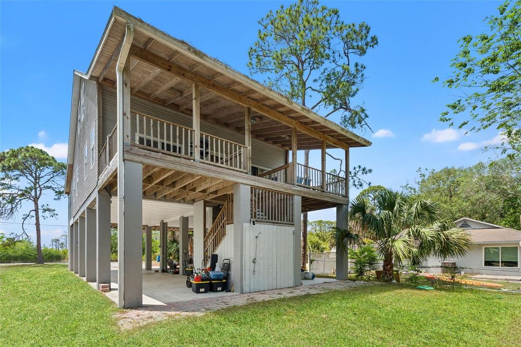 Photo of 1566 Indian Bay Road, Spring Hill, FL 34607 (MLS # TB8501398)