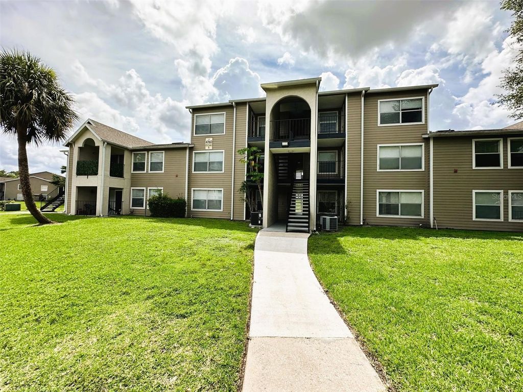 Photo of 4760 Walden Circle #5-31, Orlando, FL 32811 (MLS # O6398696)