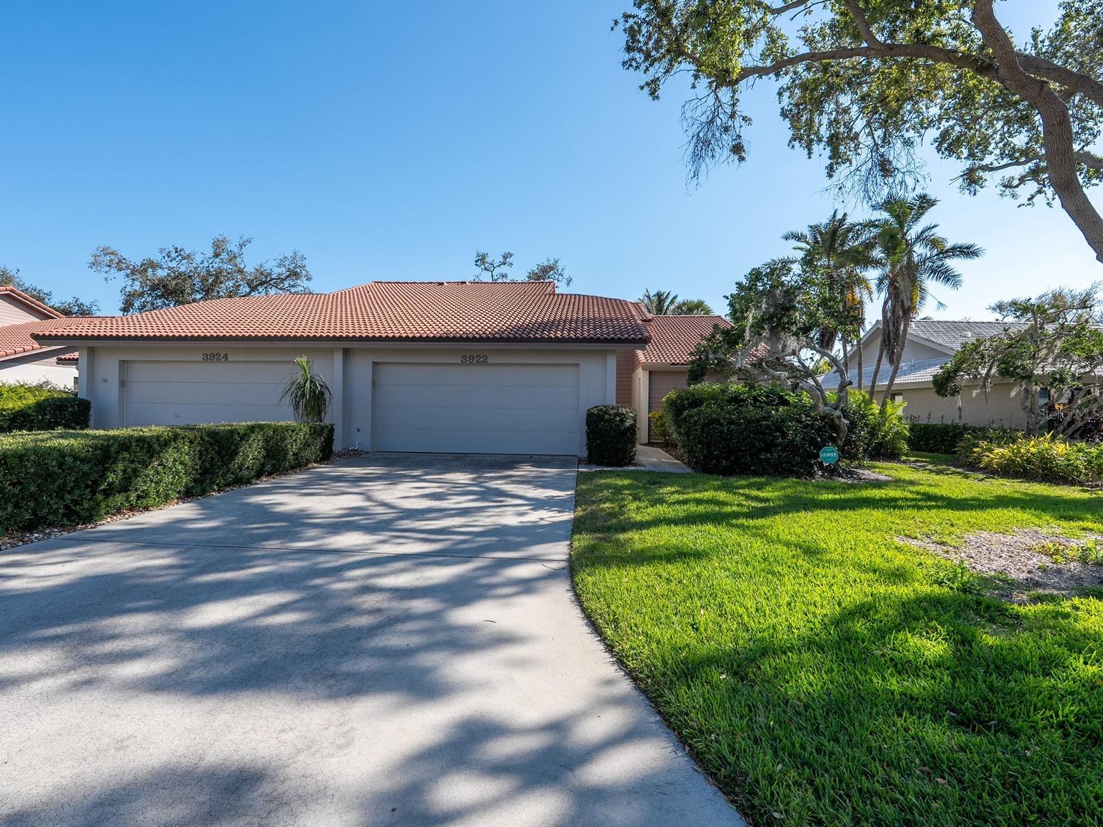 For Rent: Maintenance-Free Villa in Lakeshore Village. This beautifully maintained villa is ideally located on the serene boundary of Lakeshore Village, adjacent to a tranquil residential neighborhood. This vibrant 55+ community offers an engaging lifestyle with a variety of activities for mature individuals. This ready-to-move-in villa features a fresh coat of paint and a spacious great room layout, complete with two primary suites, providing enhanced comfort and privacy for residents. The inviting eat-in kitchen, beautifully illuminated by recessed lighting, showcases crown molding, ample neutral cabinetry for plenty of storage, a stylish tiled backsplash, and stunning granite countertops. A built-in pantry ensures everything you need is conveniently accessible. The main living area boasts vaulted ceilings, two skylights, and sliding glass doors that lead to a covered and screened lanai, where you can enjoy the peaceful backyard—perfect for birdwatching and appreciating nature. The primary suite is accessible via sliding doors and includes a walk-in closet, with an additional closet for extra storage. The lovely private bathroom features diagonal tiled floors, separate vanities with two sinks and a makeup table, a relaxing garden soaking tub, and a separate shower equipped with a rainfall showerhead, built-in seating, and a tiled surround. The second primary bedroom suite at the front of the residence has a walk-in closet and pocket doors that enhance the flow of the villa. As part of one of Sarasota’s finest 55+ communities, you’ll have access to a clubhouse, a heated pool, tennis courts, and newly added pickleball courts, all perfect for an active lifestyle. Centrally located near I-75, this villa is just minutes away from a wide range of shopping, dining, and healthcare facilities. Plus, breathtaking beaches and the vibrant downtown scene are only a short drive away. Experience the ideal combination of convenience and a rich lifestyle in this remarkable community!