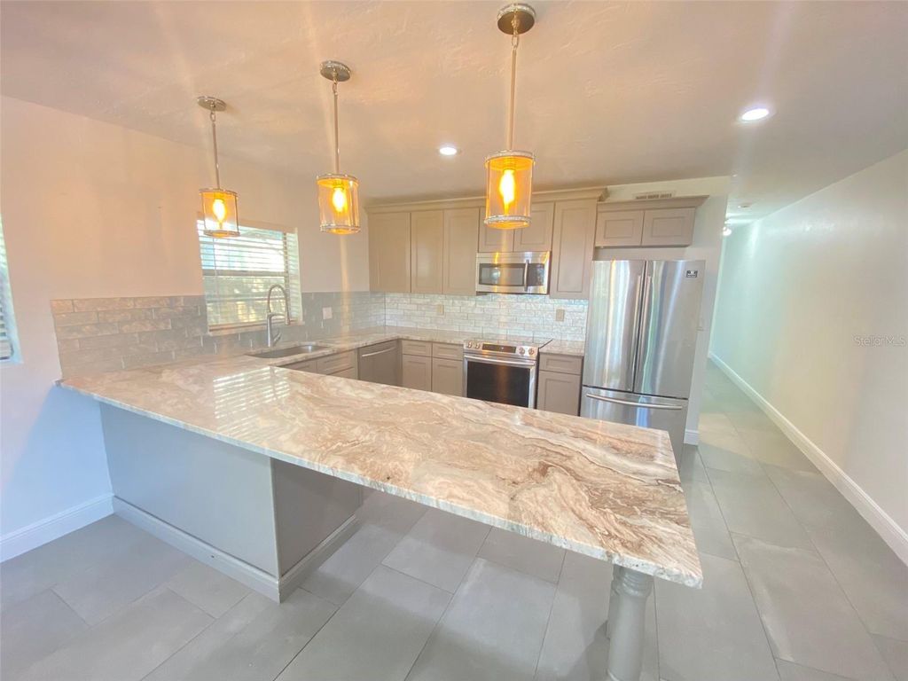 Photo of 1001 E Pine Street, Orlando, FL 32801 (MLS # O6400307)