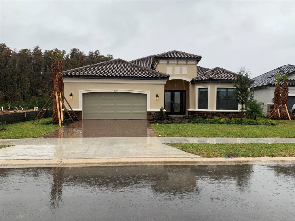 Photo of 4819 Rosatti Road, Wesley Chapel, FL 33543 (MLS # J969896)