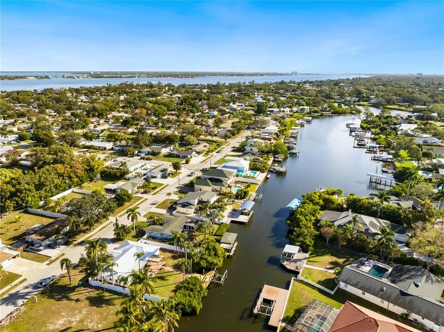 Stunning Fully Renovated Waterfront Retreat – 4 Bed | 2.5 Bath with Private Dock & Boat Lift

Experience the ultimate in waterfront living with this meticulously renovated 4-bedroom, 2.5-bathroom home, perfectly positioned on the water for effortless boating access. Completely transformed from top to bottom, this modern gem boasts an open-concept layout flooded with natural light, featuring a gourmet kitchen with stainless steel appliances, quartz countertops, and custom cabinetry. The spacious living areas flow seamlessly to outdoor entertaining spaces, ideal for enjoying sunsets on the water. The primary suite offers a serene escape with water views,  en-suite bath, and ample closet space. Three additional bedrooms provide plenty of room for family and guests, complemented by beautifully updated bathrooms.
Step outside to your private dock equipped with a boat lift – ready for your vessel and direct access to open water adventures, whether it’s fishing, cruising, or simply relaxing on the deck. A large yard provides space to add a pool!
This waterfront paradise combines contemporary elegance with the relaxed coastal lifestyle you’ve been dreaming of. Don’t miss this rare opportunity to own on Warner's Bayou!