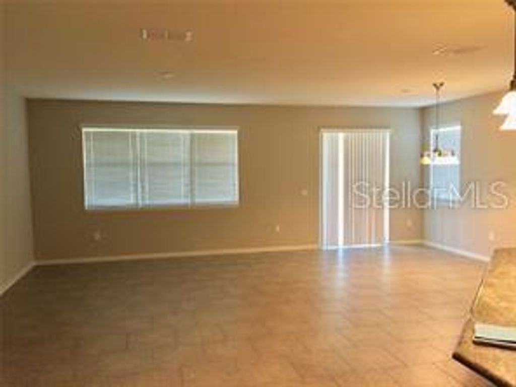Photo of 8821 Arrabida Lane, Orlando, FL 32836 (MLS # O6412332)