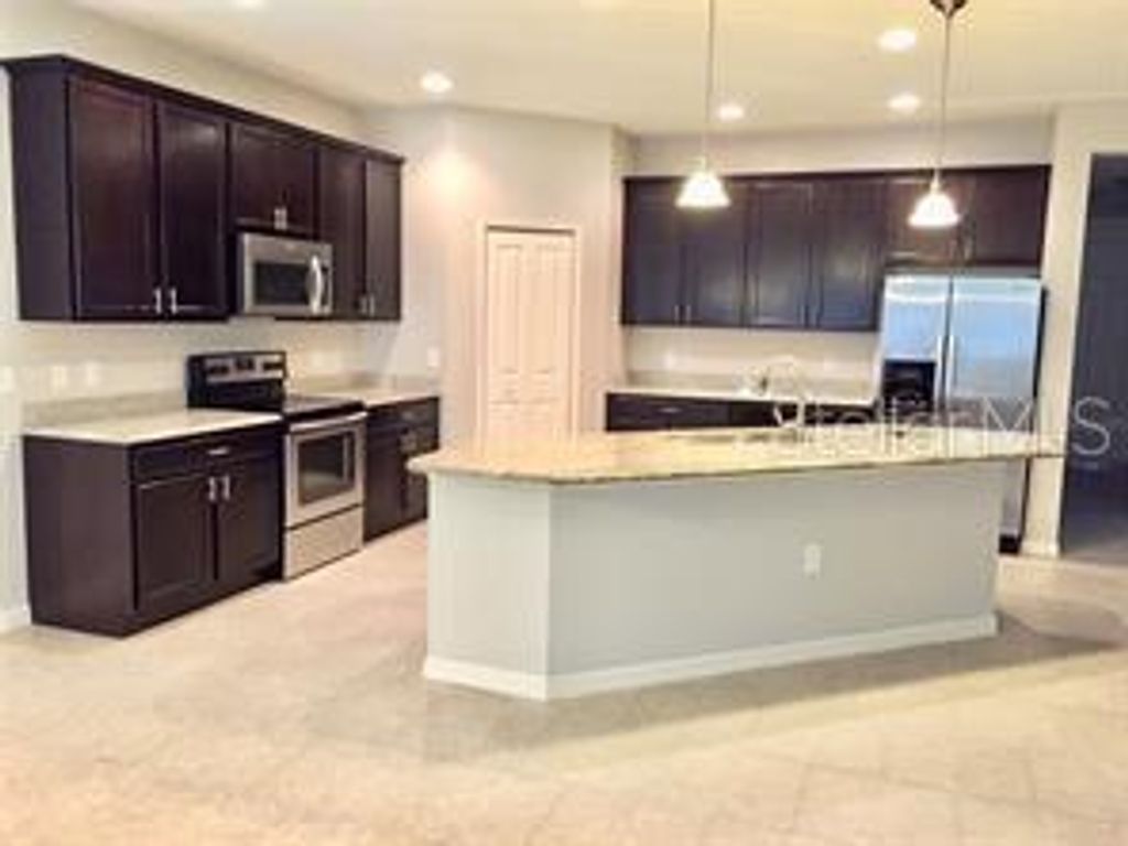 Photo of 8821 Arrabida Lane, Orlando, FL 32836 (MLS # O6412332)