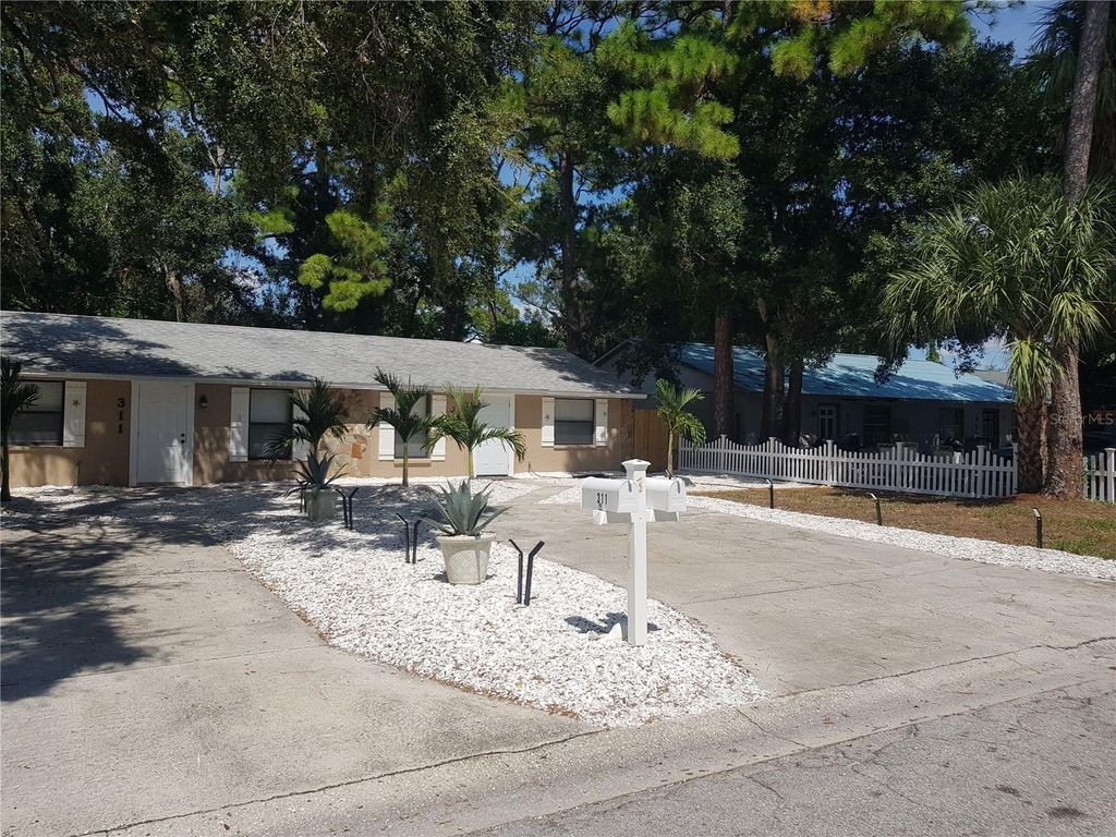 Photo of 311 58th Avenue E, Bradenton, FL 34203 (MLS # A4667402)