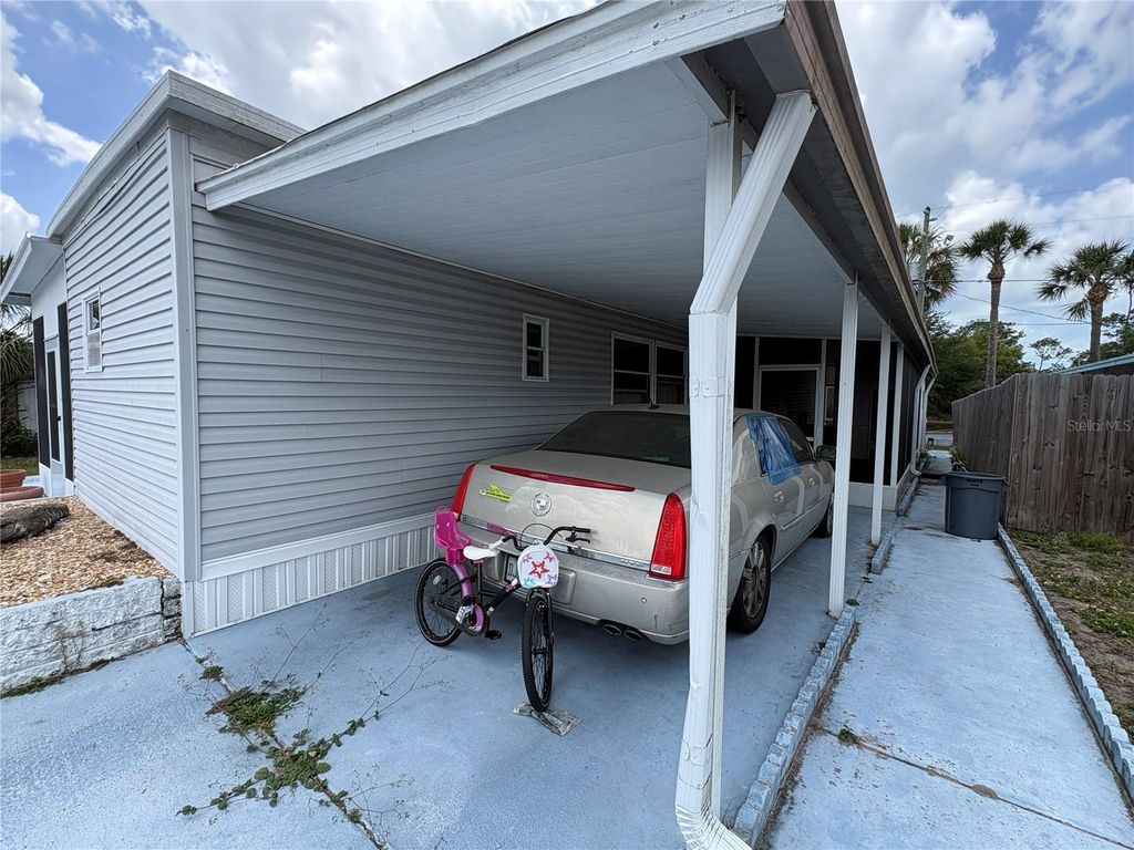 Photo of 6605 Durian Trail, New Port Richey, FL 34653 (MLS # TB8510898)