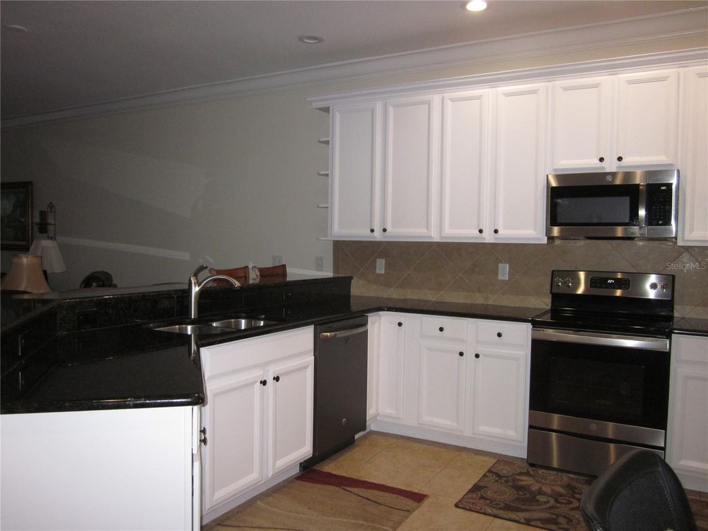 Photo of 4015 Courtside Way, Tampa, FL 33618 (MLS # TB8472344)