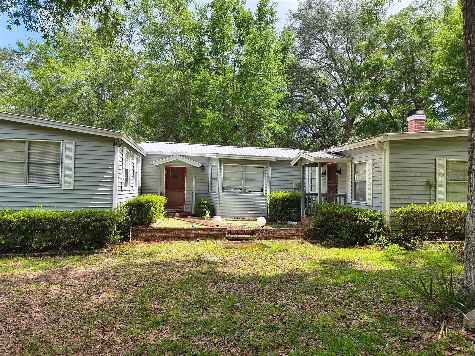 Quiet 3 bedroom 2 bathroom home off Highway 19. Just a few miles from Salt Springs. Almost 2 acres of cleared land with plenty of outside storage.
Carport offers covered parking for 4 vehicles.